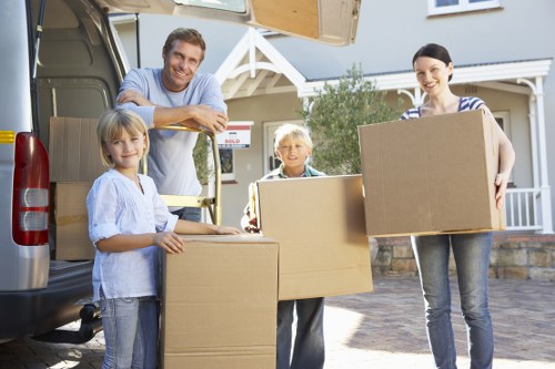Professional movers handling furniture