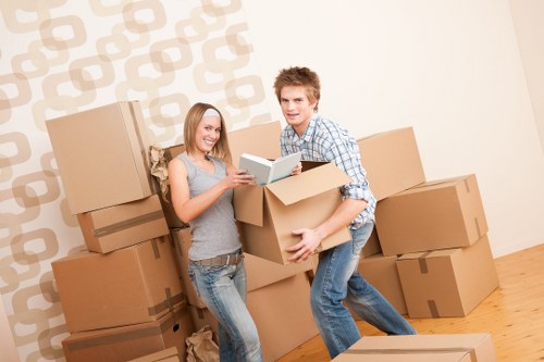 Professional movers handling furniture with care