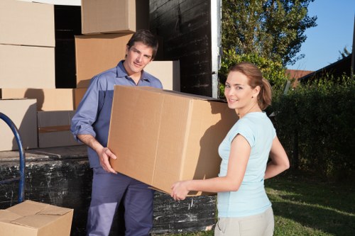Professional movers loading items into a truck